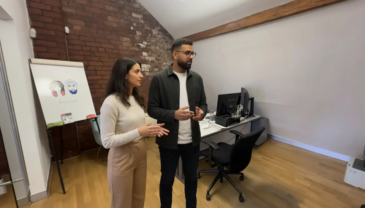 Omar and Sara discussing STEM TikTok content inside a UK creator studio.